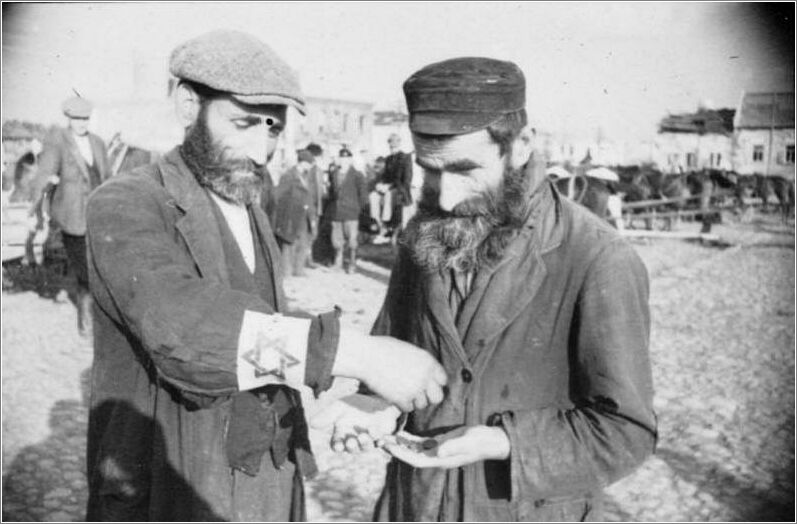 Jews conduct a transaction in the Radom ghetto